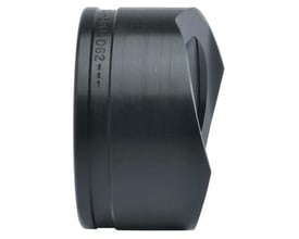 Sidetekst detaljeret billede af stempel med 63,5 mm diameter til hulstanser, fremstillet af mørkt metal.