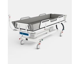 Pressalit brusemadras i antracit til MSCT 1, vist fra siden på hvid baggrund med hjul og betjeningspanel.