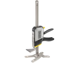 Stanley Fatmax Tradelift løfteværktøj, 150kg kapacitet, med synlig justeringsmekanisme og fire skruehuller til montering.