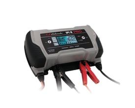 Schumacher SPI 16 PRO batterilader i grå og sort, med tydelig visning af 16.0A på den digitale skærm.
