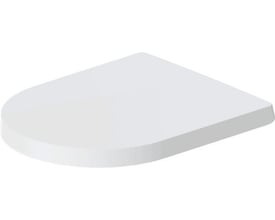 Vinklet billede af Duravit ME by Starck toiletsædet i hvid, der viser den glatte overflade og bløde kurver.