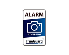 Enkelt TrueGuard foto alarm klistermærke med "ALARM FOTOSENSOR" og TrueGuard logo, designet til vinduer.