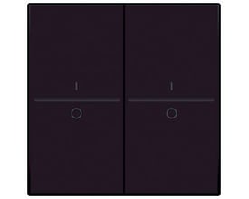 Niko tangent med i/o symbol til 4-tryk i mørkebrun finish, viser to kontakter med tydelige symboler på en neutral baggrund.