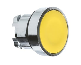 Detalje af Schneider Electric trykknap med gul front, kromring og monteringsclips, Ø 22 mm, vist fra en let vinkel.