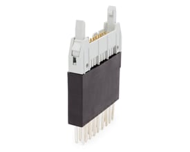 Weidmüller interfacemodul med terminaler og stik, vist skråt med hvid top, mørk krop og lange tilslutningsben.