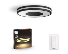 Sort Philips Hue Being loftslampe med White ambiance og ringformet skærm, set skråt nedefra.
