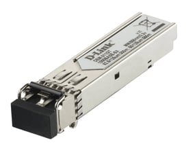 D-Link DEM-311GT/10 transceivermodul med sølvfarvet metalhus og sort beskyttelseshætte på stikket.