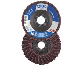 Nærbillede af to Tyrolit Lamelrondel SCM 125 x 22 mm, A medium P, der viser lamellernes tæthed og den medium abrasive kvalitet.