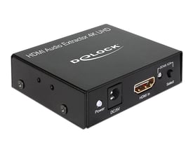 DeLOCK HDMI audio extractor 4K UHD i sort metalhus med HDMI-indgang og knapper til strøm og lydvalg.