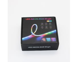 LEDlife RGBIC Neon Flex lysslange i en tæt cirkulær form, lyser i forskellige regnbuefarver mod sort baggrund.