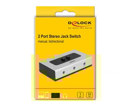 DeLock 2-ports stereo jack switch i originalemballage med klar afbildning af produktet og logo.