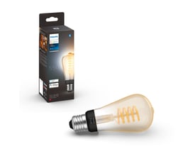 Philips Hue White Ambiance E27-filamentpære med synligt snoet filament, vist sammen med sin emballage.