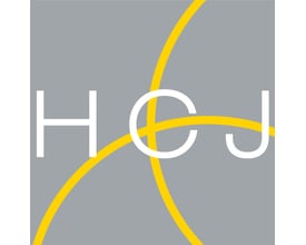 Logo med bogstaverne H, C og J omkranset af gule linjer på grå baggrund.