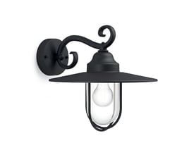 Nærbillede af den sorte Philips MyGarden Pasture væglampe med klar glasrøntgen og E27 fatning.