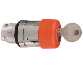 Detaljebillede af Schneider Electric sikkerhedsnødstop i sølvfarvet metal med orange knap og nøgle med nummer 455.