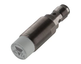 Carlo Gavazzi M18 induktivsensor, kort og uskærmet model med gevindhus og grå sensorende, 20 mm rækkevidde.