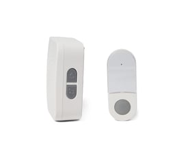 Michaela trådløst dørklokke-kit med kinetisk tryk. Hvidt lydgiver-modul og kinetisk dørknap vises side om side.