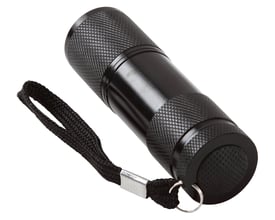 Bagfra set sort UV lygte med aftagelig snor, illustrerer tænd/sluk-knappen og batteridækslet på en hvid baggrund.