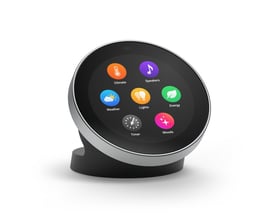 Homey Portal smart home-controller med rund touchskærm, sølvfarvet drejering og farverige styringsikoner på skærmen.