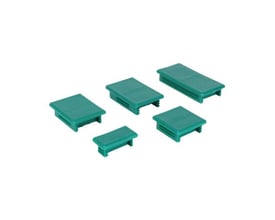 Grøn Walraven Rapidstrut-endeprop til 41 × 82 mm profilskinne, vist skråt ovenfra med den brede topflade synlig.