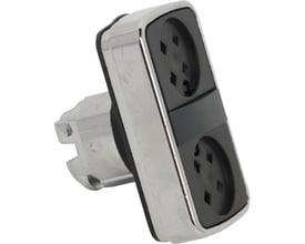 Vinklet billede af Schneider Electric dobbelt trykknap med krom detaljer og 22 mm monteringsdiameter.