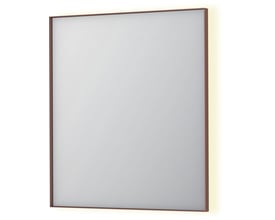 Sanibell INK SP32 spejl med børstet kobberramme, 70x80 cm, viser indirekte LED-belysning på baggrunden.