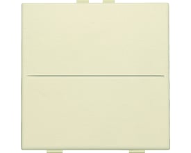 Niko trådløs tangent til 2-tryk i cremehvid farve, med en vandret rille på midten og diskrete monteringsklips.