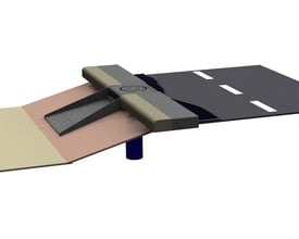 Ulefos 315 mm karm med sideindløb og justerbart vandbræt monteret ved en vejbane og et regnbed. Karm i sejjern med belastningsklasse D400.