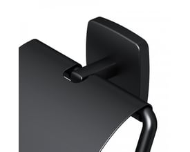 Nærbillede af AM.PM Gem toiletpapirholder med låg i mat sort, viser detaljer ved ophæng og holder.