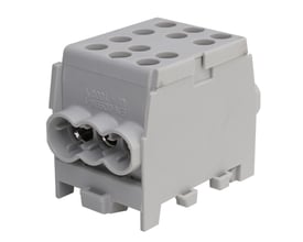Grå Pollmann Elektrotechnik-fordelerblok, 25/16 mm² og 1/4, set skråt forfra med tilslutninger synlige.