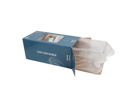 Nordic Quality dåseholder i transparent plastik, delvist pakket ud af sin blå æske med produktillustrationer.