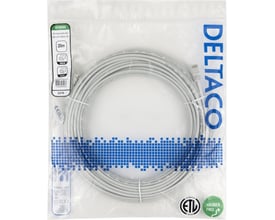 Gråt U/UTP Cat6 AWG28 patchkabel på 20 meter, oprullet i emballage med RJ45-stik synlige.
