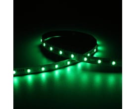 Ansell Lighting Z-Cell LED bånd lyser med grønt lys på en mørk overflade, 12mm bredt med synlige LED'er.