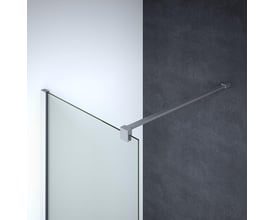 Dansani Match stabiliseringsstang i satin aluminium forbundet mellem en brusevæg af glas og en væg, viser et nærbillede af monteringsbeslaget.