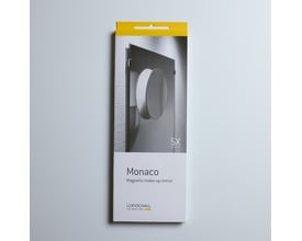 Loevschall Monaco magnetisk make-up spejl med 5x forstørrelse, diameter 15 cm, i krom, præsenteret på emballage.