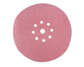 Makita slibepapir Ø225 mm, K180 korn, med en cirkulær stjerneformet række af hvide huller til støvopsamling på en lyserød overflade.