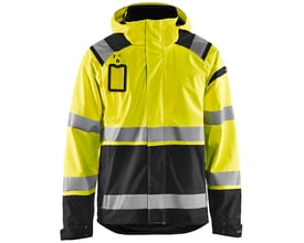 Blåkläder Workwear HIGH-VIS skaljakke i gul og sort med refleksdetaljer, udstyret med ID-kortlomme og aftagelig hætte.