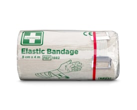 Nærbillede af Cederroth elastisk bandage 1882, viser tekstur af materialet, røde kantbånd og fastgørelsesclips.