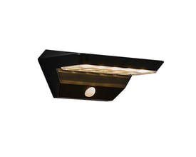 Nærbillede af Nordlux Agena udendørs væglampen i sort, viser detaljer som sensor og LED lyskilde.