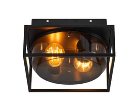 Nordlux Griffin loftlampe med tændte pærer, hvor det røgfarvede glas og sorte stel skaber stemningsfuld belysning.