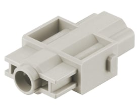 Lysegrå Harting 100A enkeltmodul stikindsats hun, vist isoleret på hvid baggrund, med fokus på dens form og stikåbning.