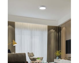 V-TAC 12W solpanel installeret i et moderne stue loft, der skaber en varm og indbydende atmosfære.