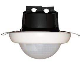 B.E.G. LUXOMAT® PD4N-1C-I bevægelsessensor til indbygning, med hvidt frontpanel og mørk indbygningsdel på hvid baggrund.