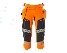 Mascot Hi-Vis knickers i orange og mørk marine med hængelommer, synlige reflekser og forstærkninger.