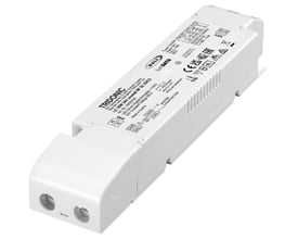 Tridonic LED driver DALI-2 LC 35W 24V one4all NF SC EXC2 SP, hvid kompakt enhed med tydelig mærkning og tilslutningsmuligheder.