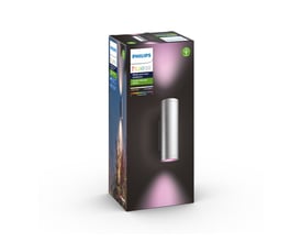 Emballagen til Philips Hue Appear udendørs væglampe i børstet aluminium viser den cylindriske lampe med farvet lys.