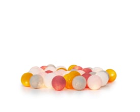 Et udvalg af IrisLights LED kugler i forskellige farver som orange, pink, grå og hvid, samlet på en lys overflade.