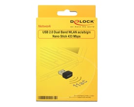 Gul emballage til DeLock USB 2.0 dualband-WLAN-nanostick med illustration af den lille USB-adapter.
