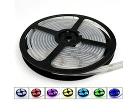 5 meter RGB Dotless COB-LED-strip på sort spole med små farveeksempler på lys i flere nuancer.