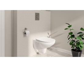 Grohe Solido Ceramics hængetoilet i hvid, med lukket skyllekant og integreret cisterne monteret på væg med mosaikfliser.